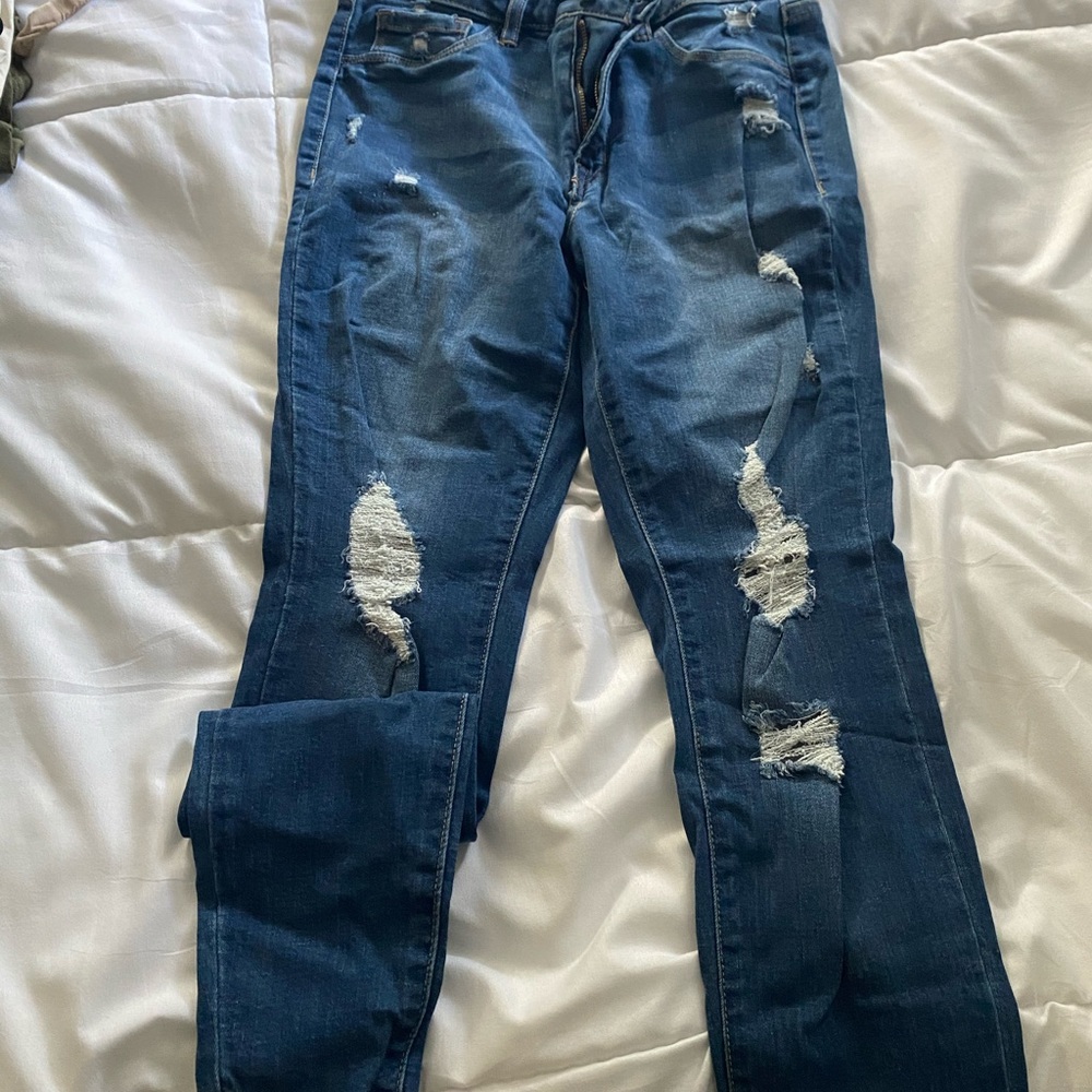 Ripped skinny blue jeans